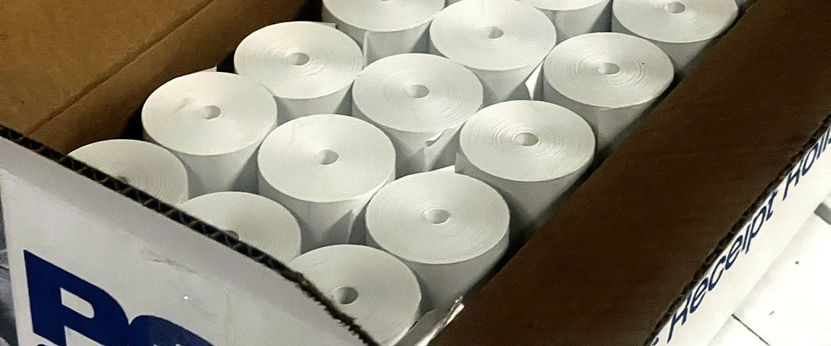 Open case of POS1 coreless thermal receipt rolls